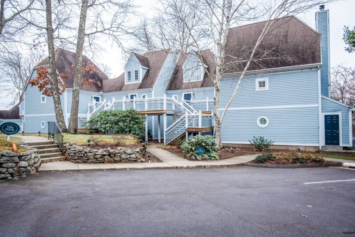 Front view of building 3. You will be in a ground level unit with a private corner entrance.