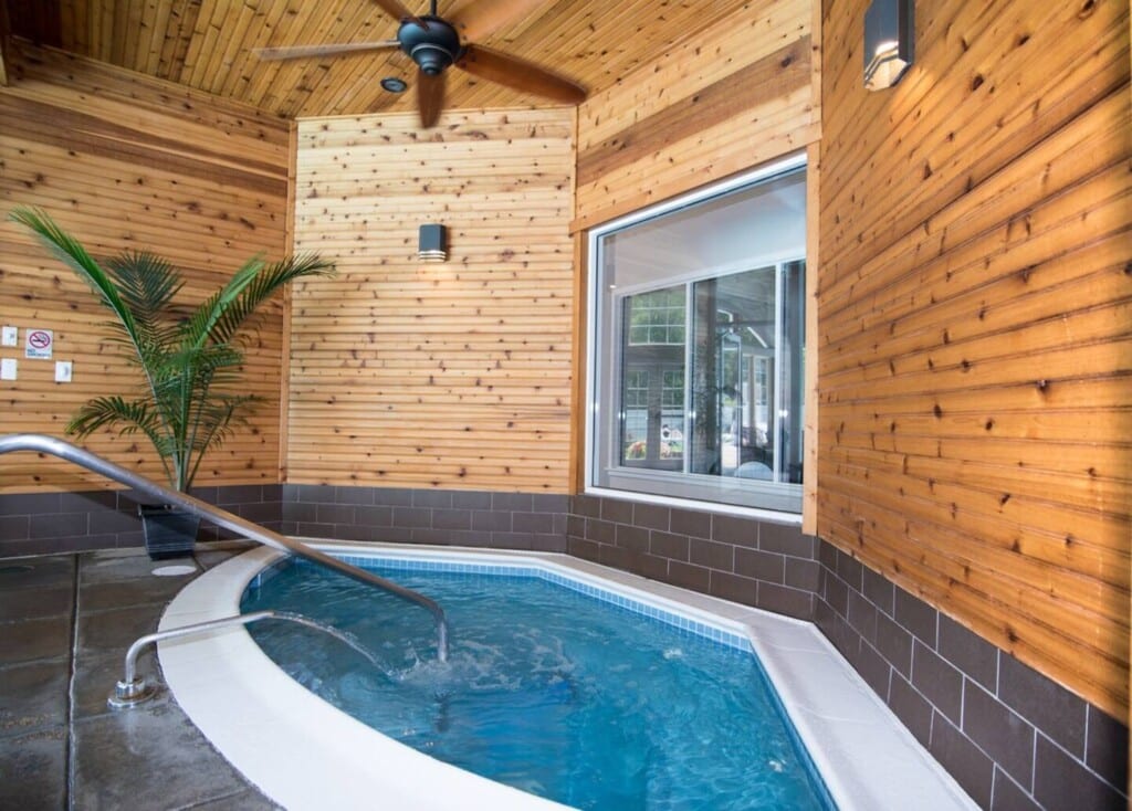Hot Tub is located in ClubHouse 1. Open all year round! Other amenities available with booking include: 2 Saltwater Pools- Open Seasonally Sauna Fitness room