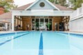 Heated Pool In Clubhouse 1. Open May-October Come enjoy this Complimentary clubhouse during your stay! Just a short walk from your villa and features a jacuzzi, sauna, and cardio room! A laundry facility is also available (fees apply).
