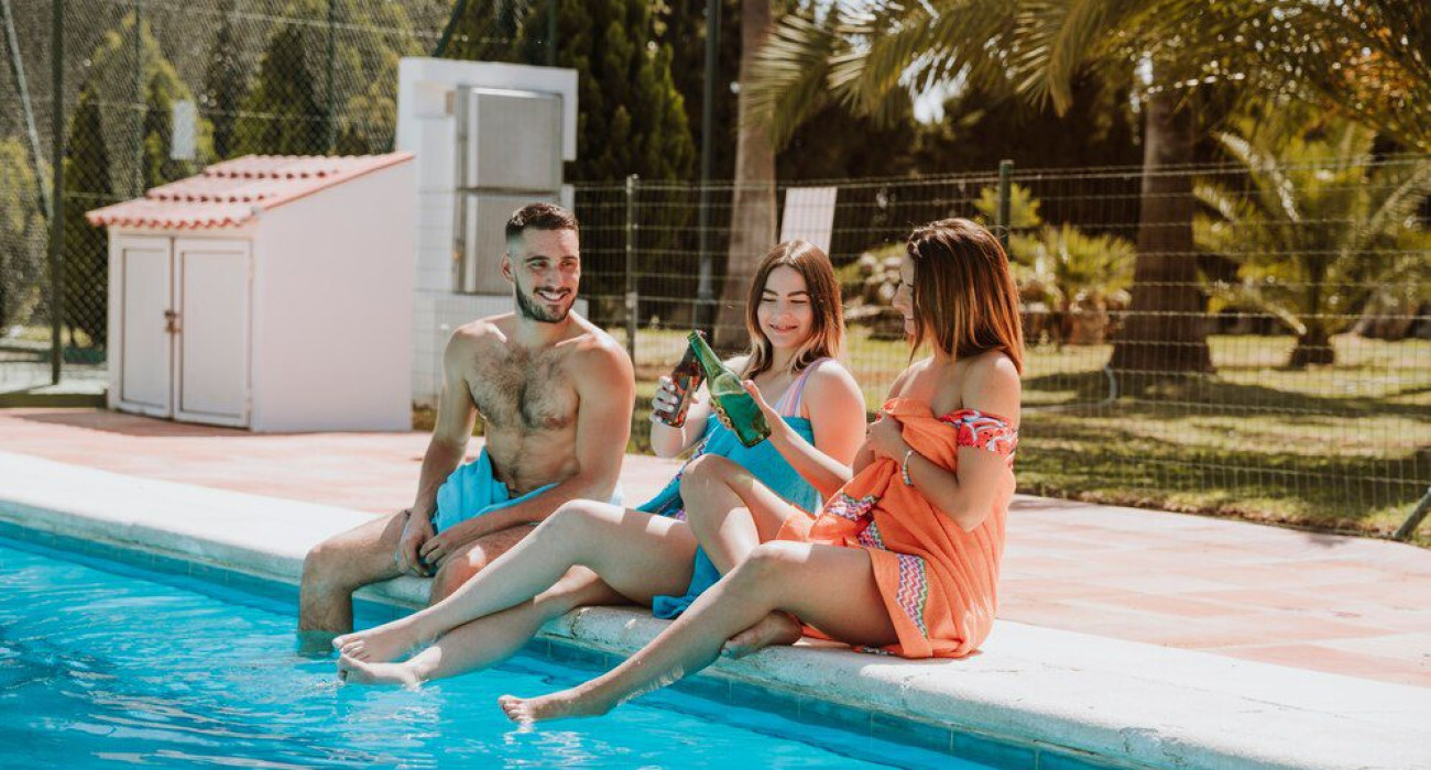 friends sitting pool 23 2147814690 swimming