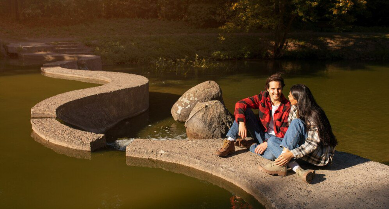 full shot couple sitting together 23 2149884225
